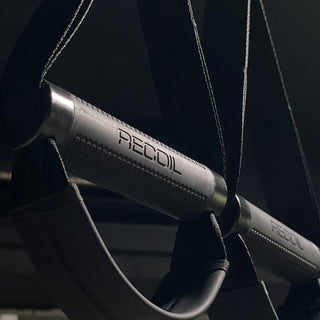 Podwieszane pasy treningowe do ćwiczeń BenchK RECOIL z uchwytem do drzwi i torbą